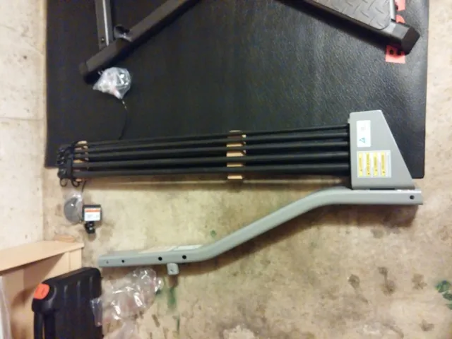 Lower lat tower assembly